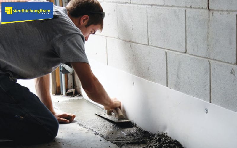 chống thấm chân tường bằng xi măng